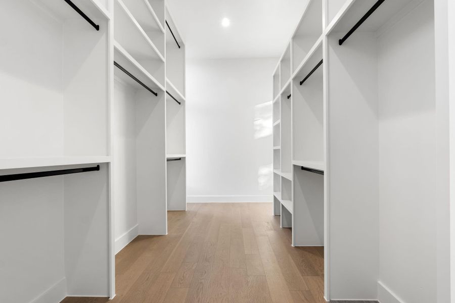 Spacious walk in closet with dual entry