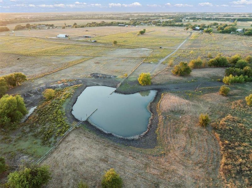 Small strip of land allows for access to the pond.