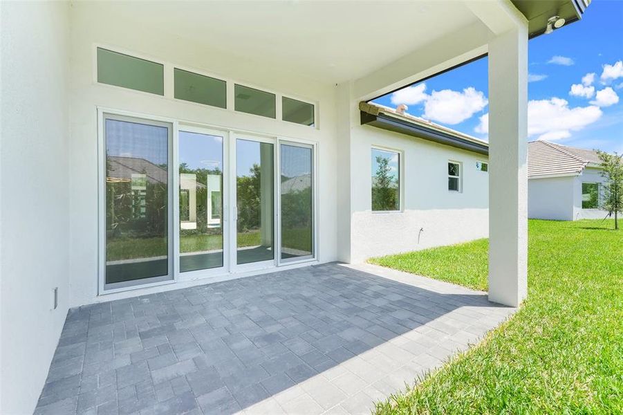 Exterior details and patio area of a home in Toscana, Palm Coast (Image 27).