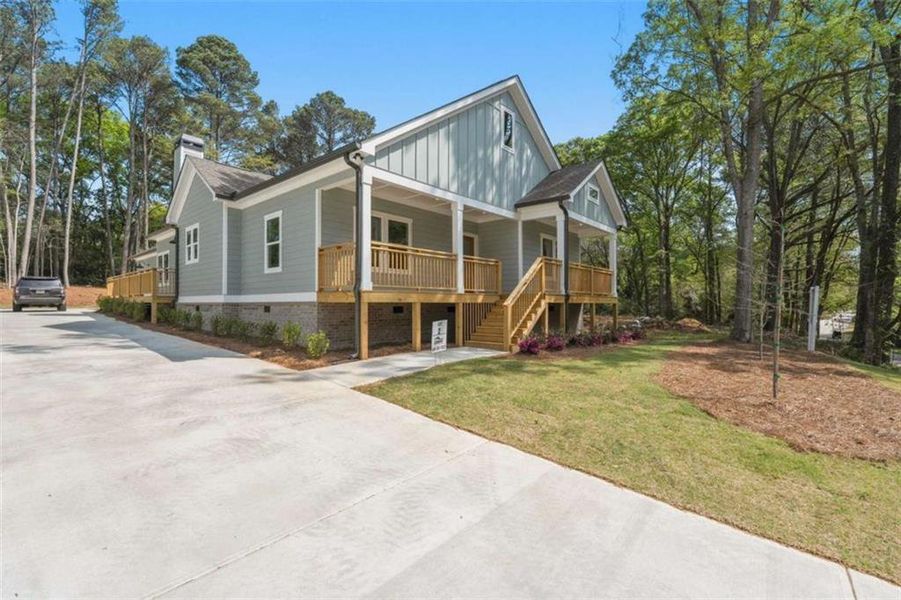 Front exterior of a new home in , Covington, GA, highlighting curb appeal (Image 28). Front exterior of a new home in , Covington, GA, highlighting curb appeal (Image 28).