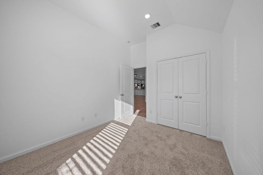 Spacious, unfurnished interior of a new home in Sunterra: Bristol Collection, Katy (Image 11).