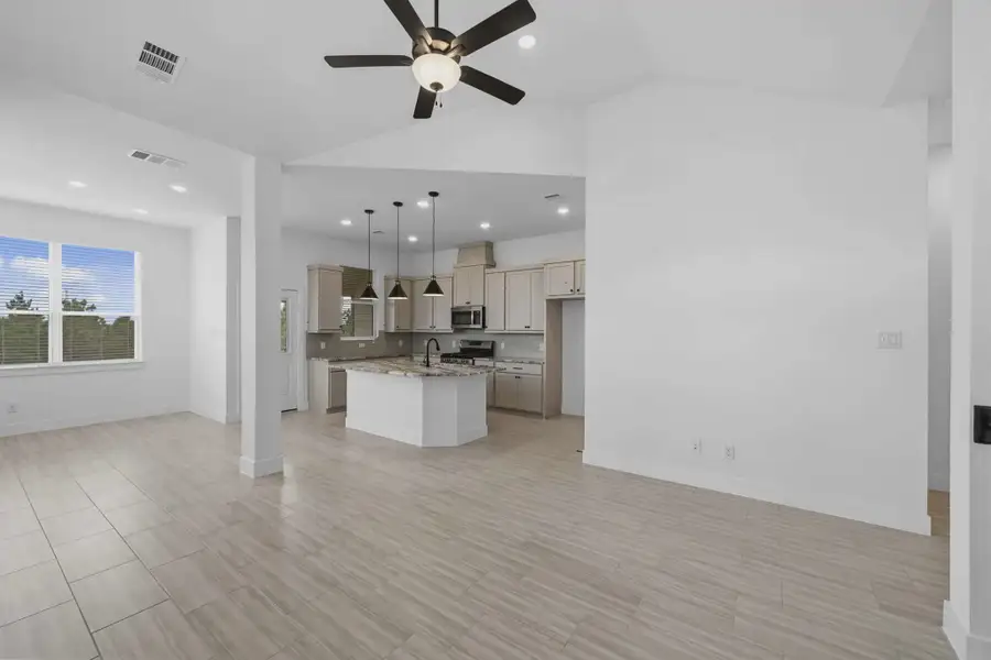 Representative unfurnished interior of a home built from the Margaux by Chesmar Homes in Bridgeland Chateau, Cypress (Image 43).
