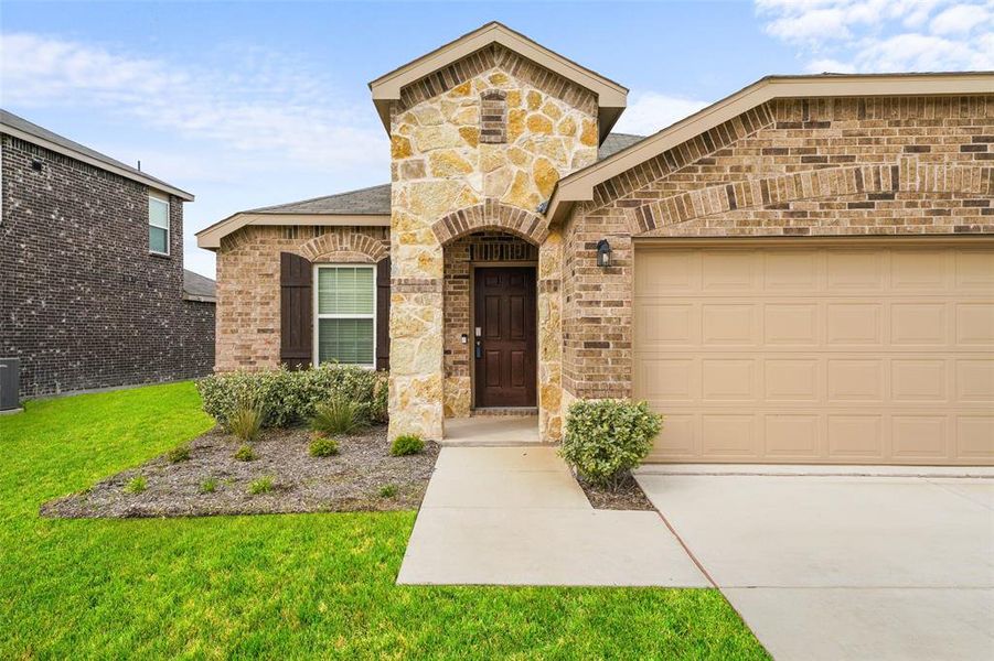 Front exterior of a new home in Arbordale, Forney, TX, highlighting curb appeal (Image 19).