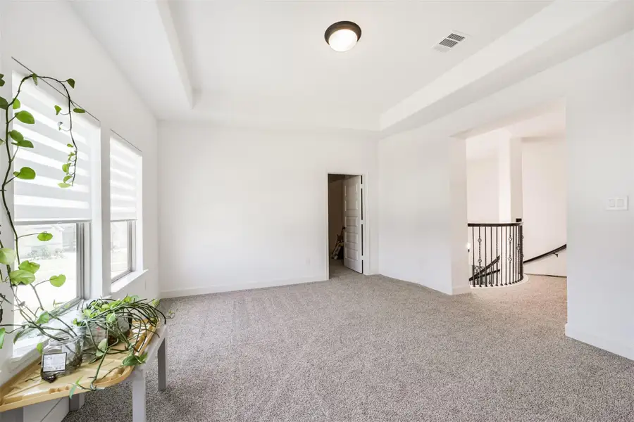 Upstairs game room with an adjoining entry to the theater room. Upstairs game room with an adjoining entry to the theater room.