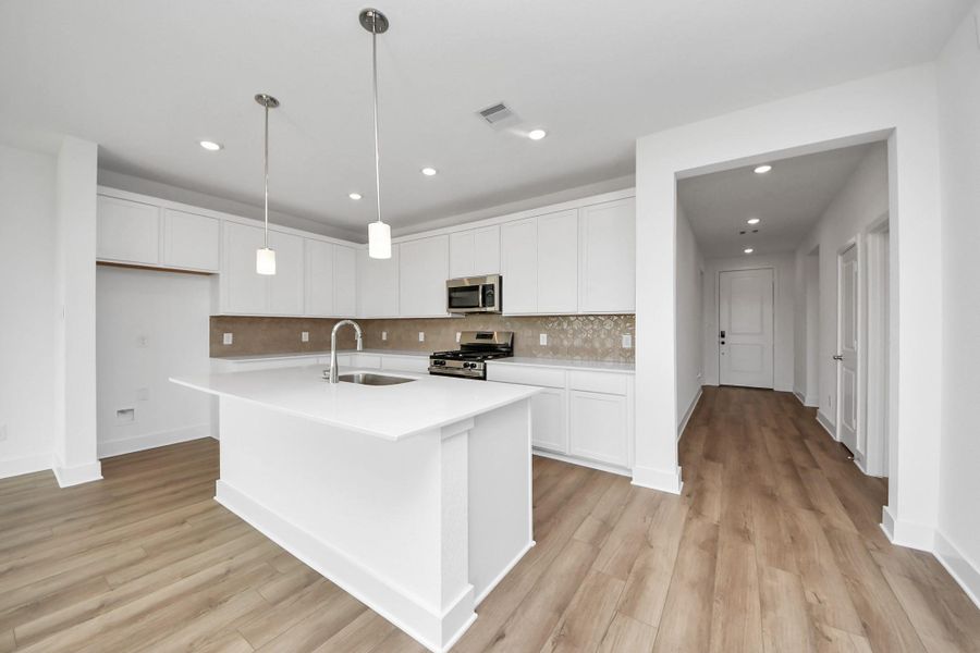Furnished interior view inside a new home in The Canopies, Splendora (Image 3).