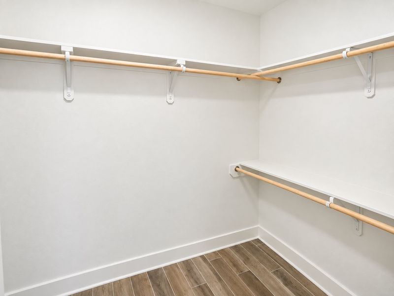 DSLD HOMES NEW CONSTRUCTION MOVE IN READY HOME IN LONGLEAF COMMUNITY LOCATED IN LUMBERTON, TX - Primary closet