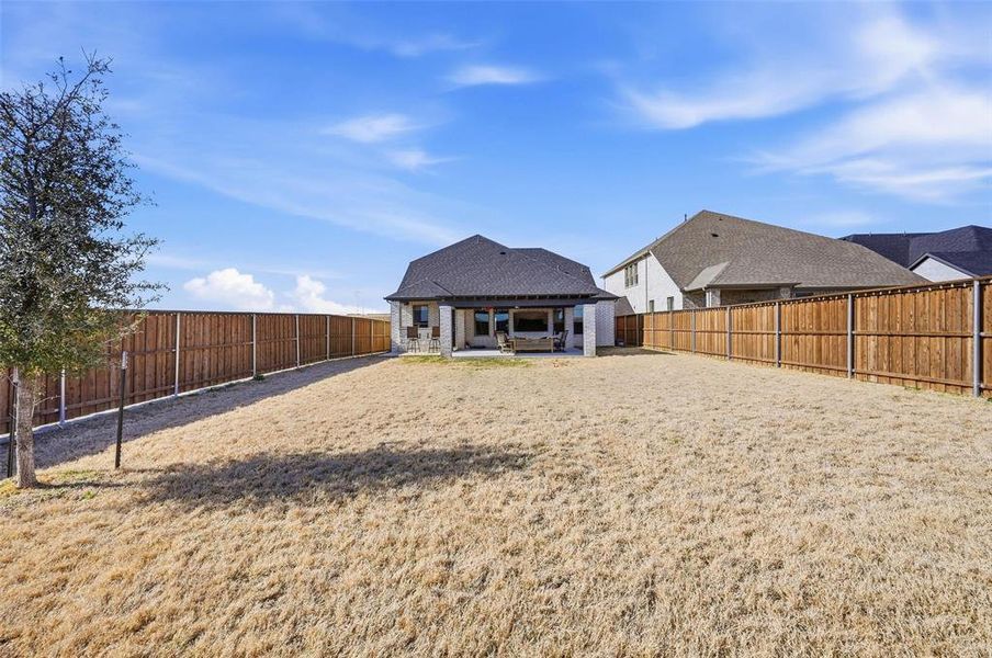 Exterior details and patio area of a home in Ventana, Fort Worth (Image 24). Exterior details and patio area of a home in Ventana, Fort Worth (Image 24).