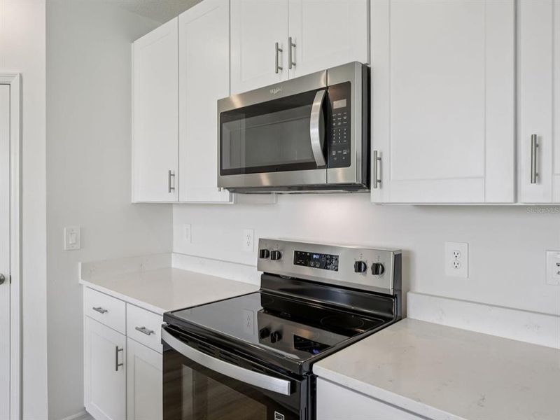 Furnished interior view inside a new home in Oakfield Trails - Premier Series, Parrish (Image 9).