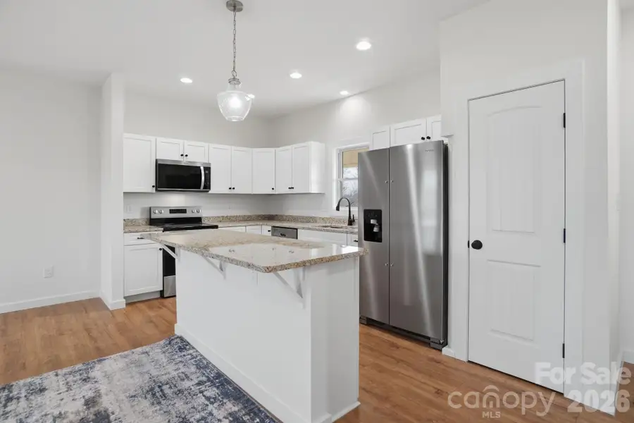 Furnished interior view inside a new home in , Newton (Image 3).
