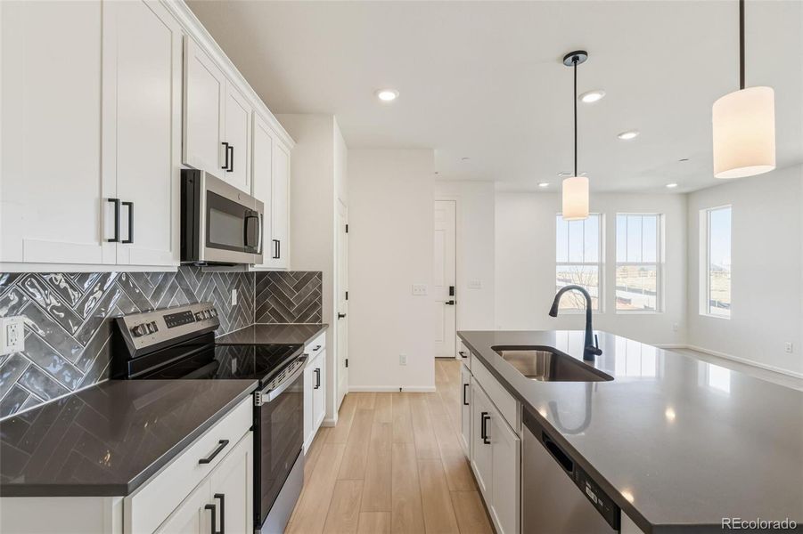 Furnished interior view inside a new home in Turnberry, Commerce City (Image 13).
