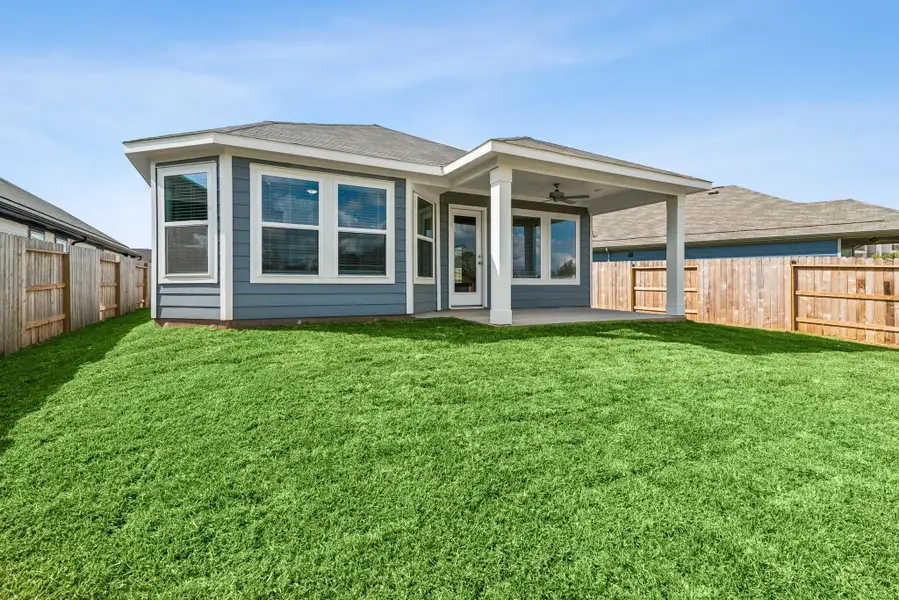 Exterior details and patio area of a home in Moran Ranch, Willis (Image 2). Exterior details and patio area of a home in Moran Ranch, Willis (Image 2).