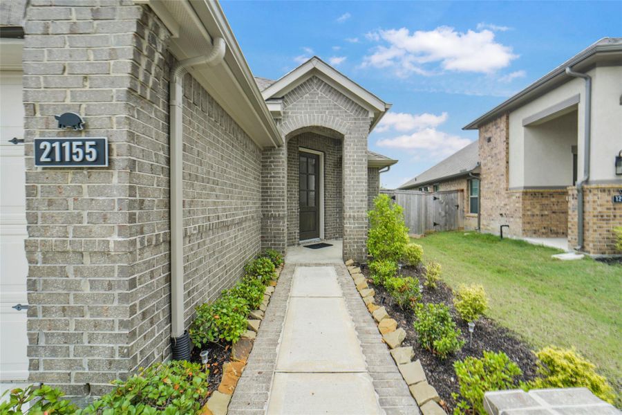 Exterior details and patio area of a home in Bridgeland, Cypress (Image 3).