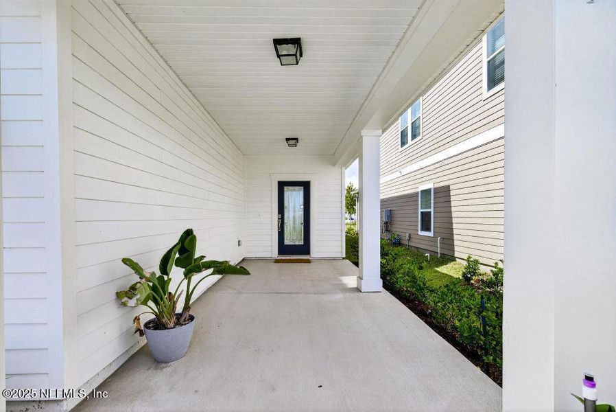 Exterior details and patio area of a home in Silver Landing at SilverLeaf, St. Augustine (Image 3).
