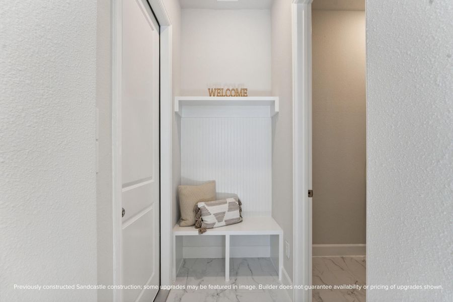 Functional Mudroom Design – A stylish and practical mudroom with built-in hooks and bench keeps your home organized and clutter-free.