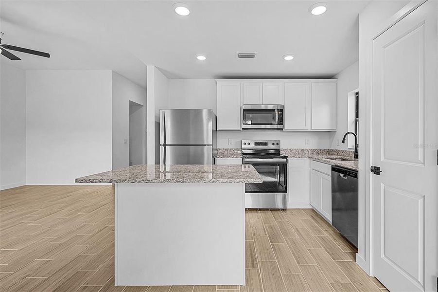 Furnished interior view inside a new home in Port Charlotte, North Port (Image 9).
