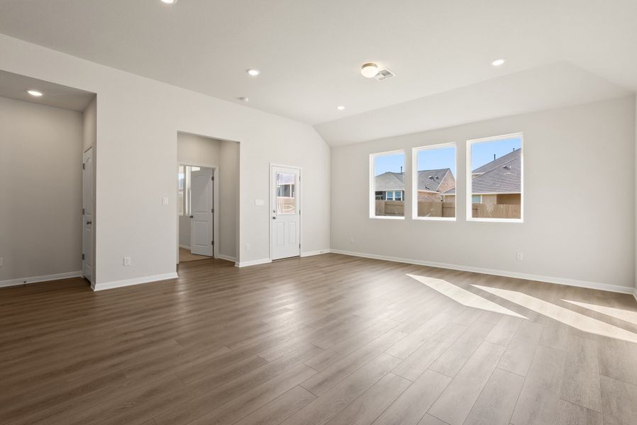 Representative unfurnished interior of a home built from the Somerville by Ashton Woods in Willow Springs, Buda (Image 28).