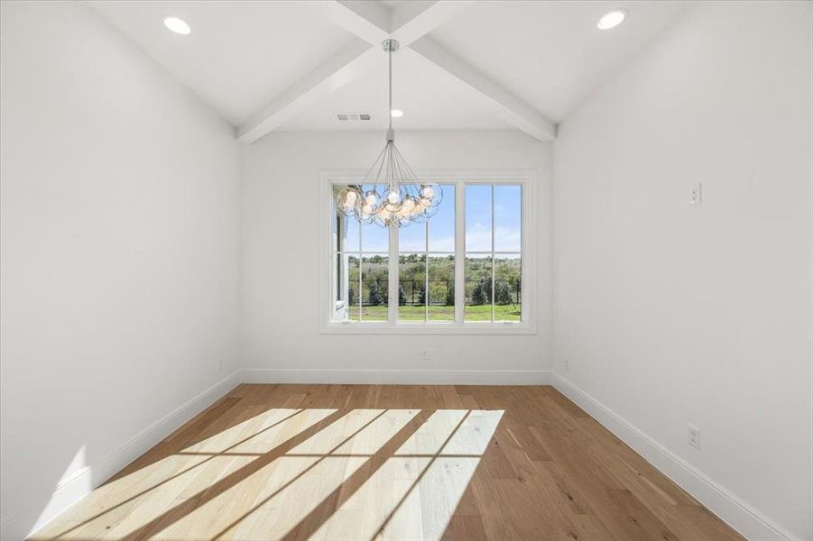Vaulted ceiling with beams, perfect for an intimate event