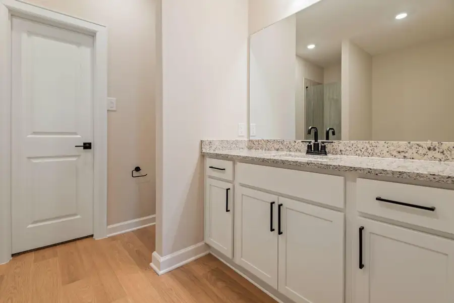 Furnished interior view inside a new home in Magnolia Woods, Magnolia (Image 8). Furnished interior view inside a new home in Magnolia Woods, Magnolia (Image 8).