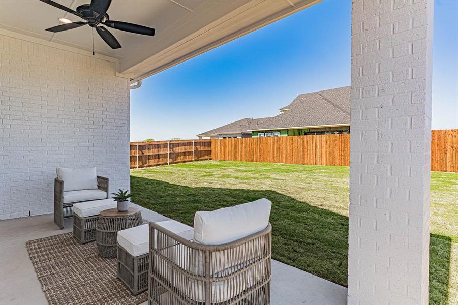 View of patio with ceiling fan