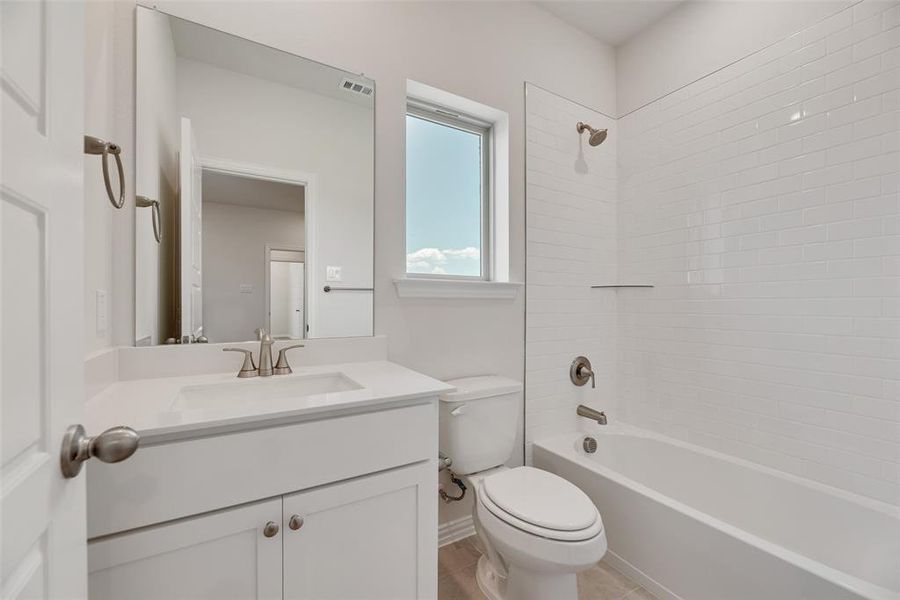 Furnished interior view inside a new home in Valencia On The Lake, Little Elm (Image 8).