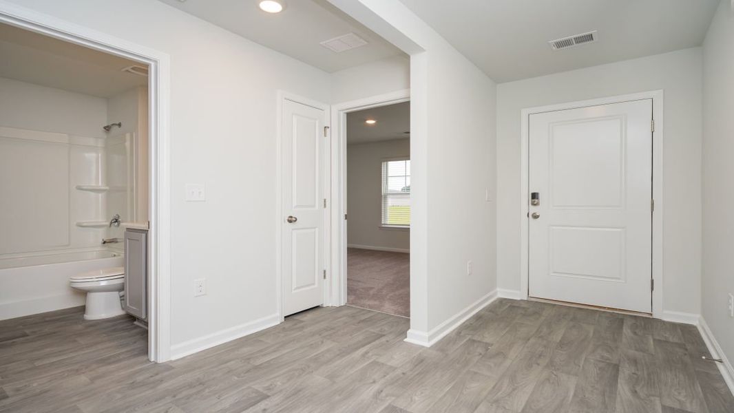 Representative unfurnished interior of a home built from the ARIA by D.R. Horton in The Meadows at Wildwood Village, Shallotte (Image 12). Representative unfurnished interior of a home built from the ARIA by D.R. Horton in The Meadows at Wildwood Village, Shallotte (Image 12).