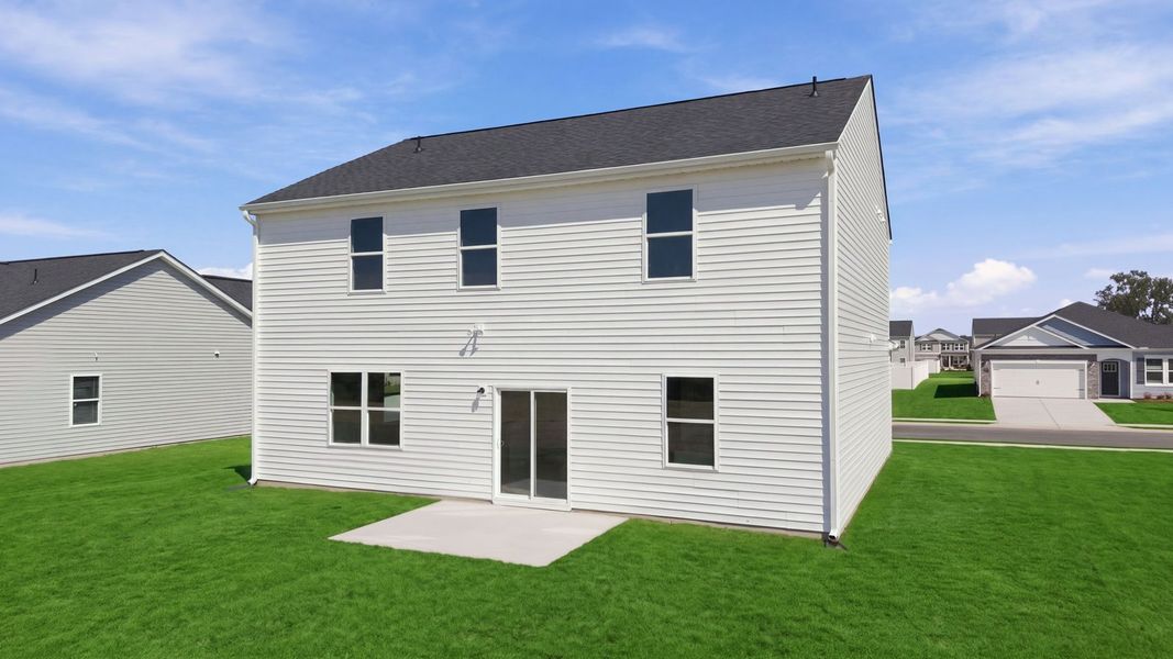 Exterior details and patio area of a home in East Ridge, Ayden (Image 20).