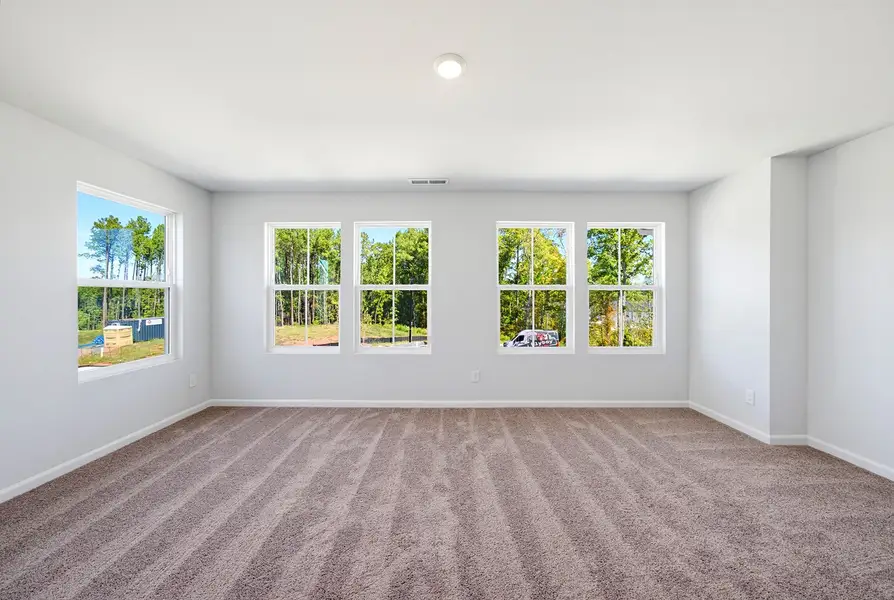 Spacious, unfurnished interior of a new home in Sweetbrier, Durham (Image 23).