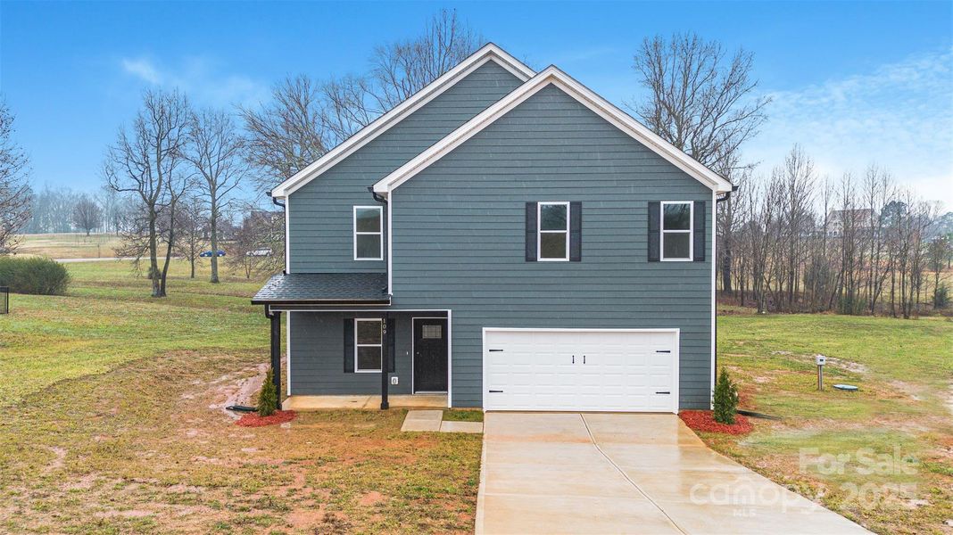 Front exterior of a new home in , Shelby, NC, highlighting curb appeal (Image 20).