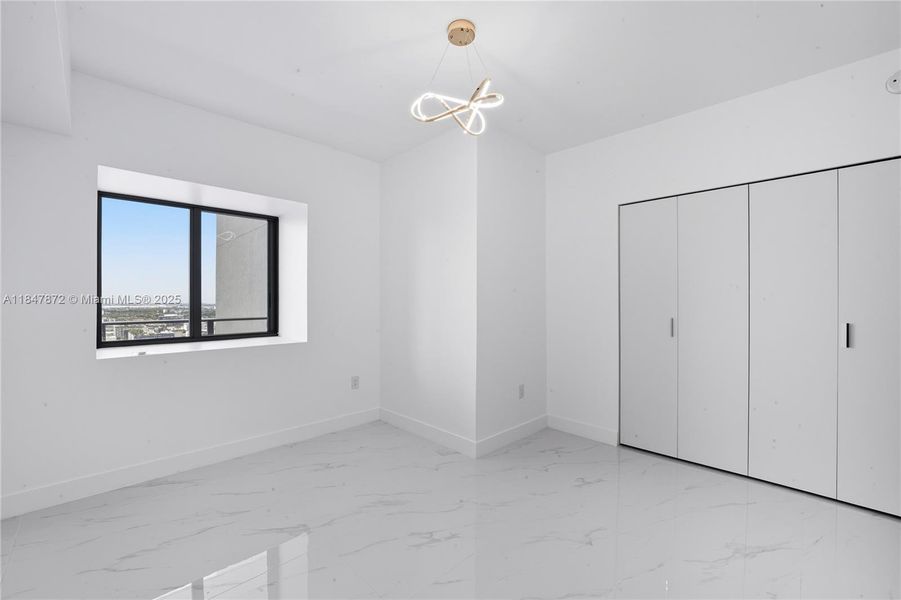 Spacious, unfurnished interior of a new home in Aria Reserve, Miami (Image 19).