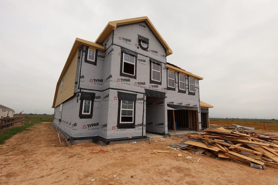 Two-story home with 6 bedrooms, 4.5 baths and 3 car garage