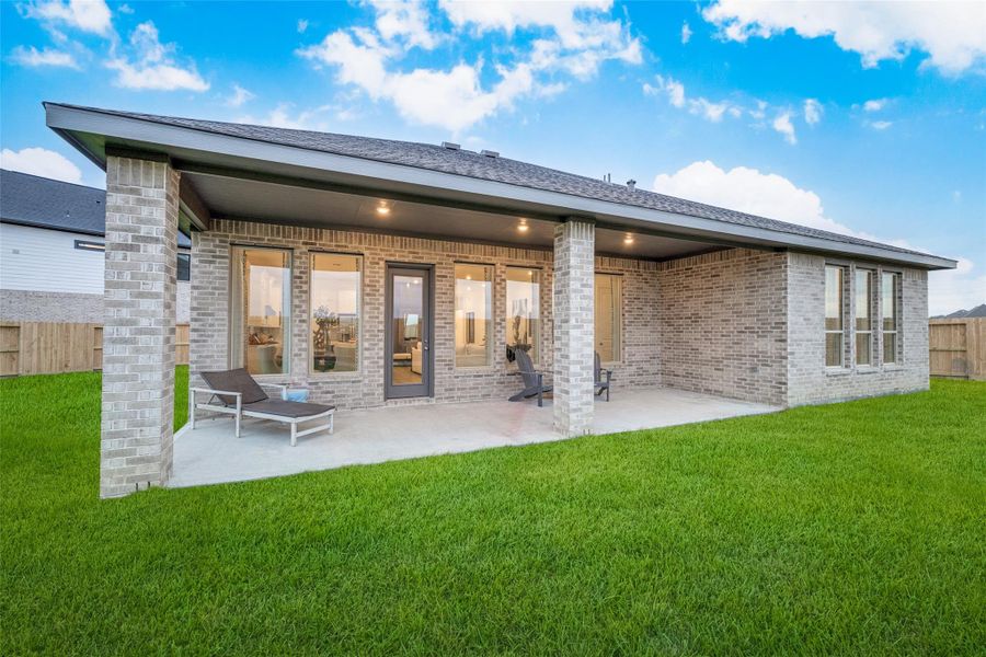 Exterior details and patio area of a home in Anniston, Katy (Image 24).