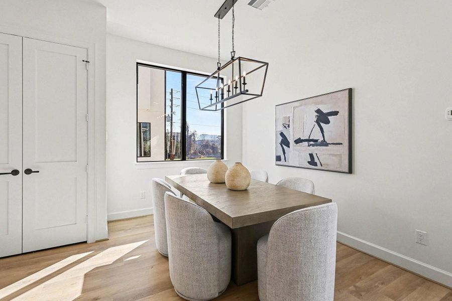 Area can accommodate a larger table and a serving piece if needed.