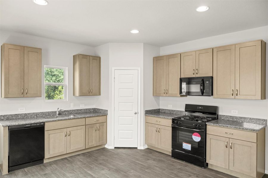 Furnished interior view inside a new home in Cloverleaf, Austin (Image 5).