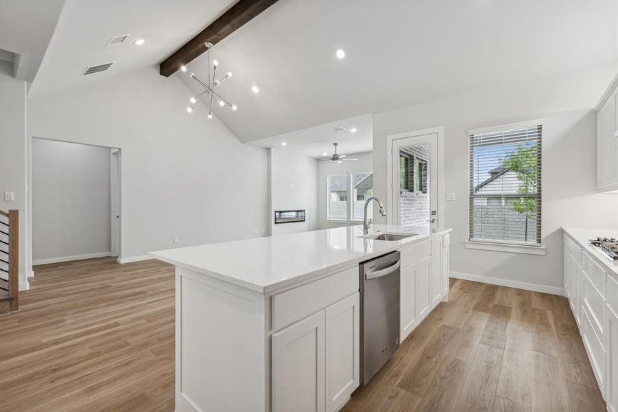 Kitchen in the Matisse home plan by Trophy Signature Homes – REPRESENTATIVE PHOTO