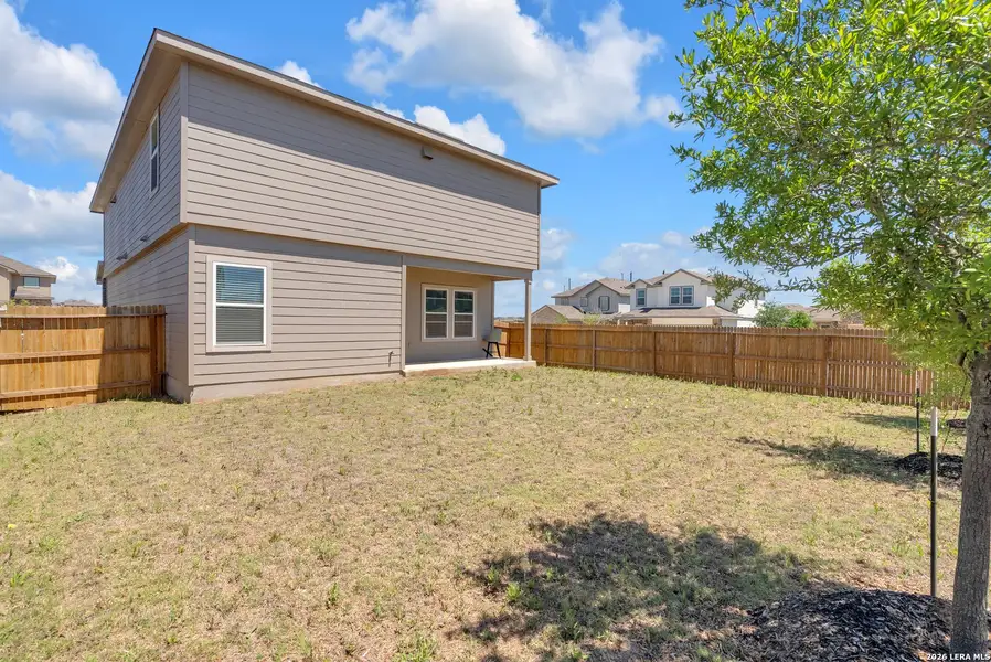 Exterior details and patio area of a home in Langdon, San Antonio (Image 4).