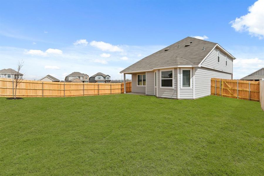 Exterior details and patio area of a home in Retreat at Fossil Creek, Fort Worth (Image 18).