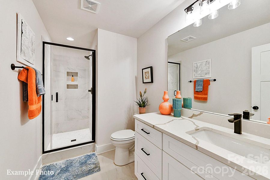 Furnished interior view inside a new home in North End Terraces, Charlotte (Image 14).