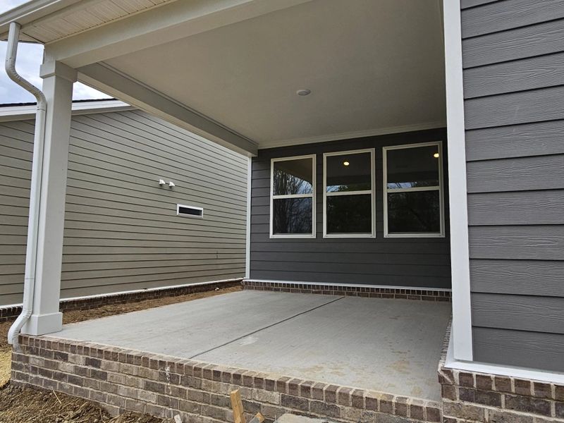 Exterior details and patio area of a home in Cedars of Cane Ridge | 55+ Community, Antioch (Image 2). Exterior details and patio area of a home in Cedars of Cane Ridge | 55+ Community, Antioch (Image 2).