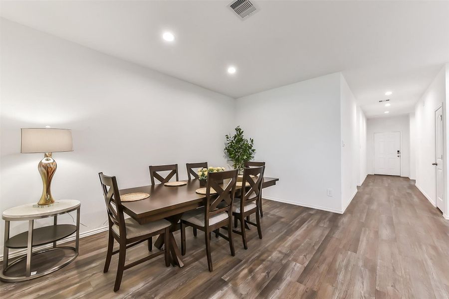 Furnished interior view inside a new home in Sunterra, Katy (Image 19).