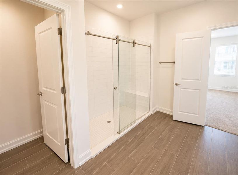 Spacious, unfurnished interior of a new home in Triple Creek: The Executives, Riverview (Image 15).