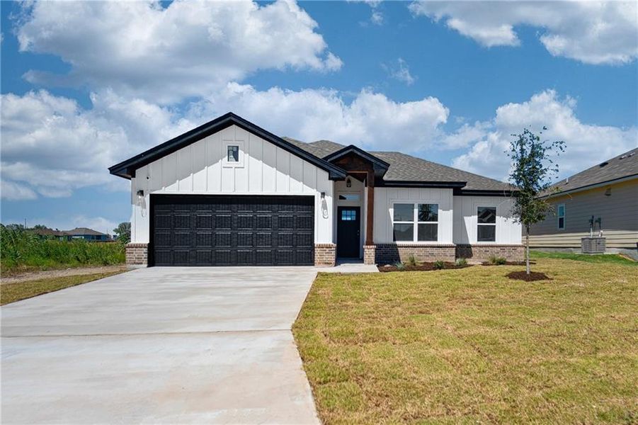 Front exterior of a new home in , Temple, TX, highlighting curb appeal (Image 15).