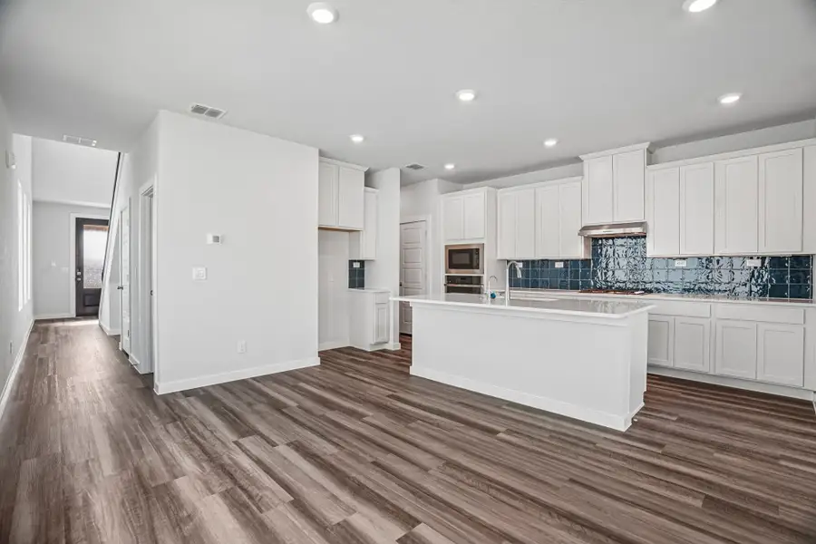 Furnished interior view inside a new home in The Meadows at Hunters Ranch, San Antonio (Image 8).