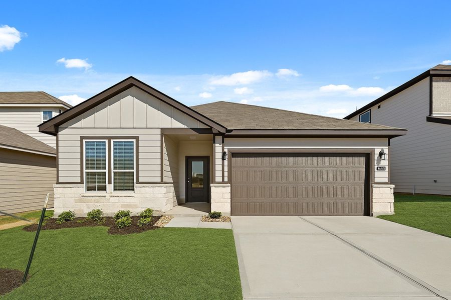 Front exterior of a new home in Reveille Estates, Bryan, TX, highlighting curb appeal (Image 1). Front exterior of a new home in Reveille Estates, Bryan, TX, highlighting curb appeal (Image 1).