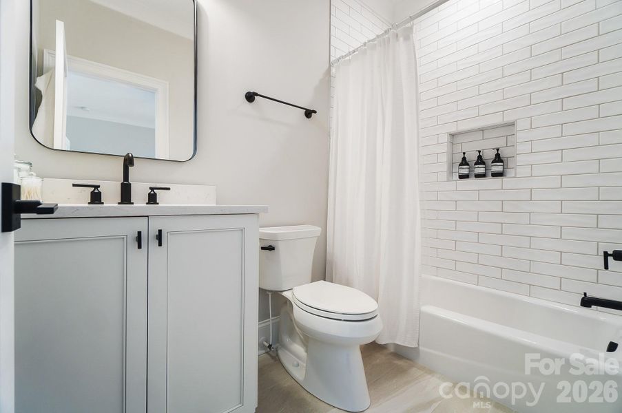 Furnished interior view inside a new home in , Weddington (Image 24).