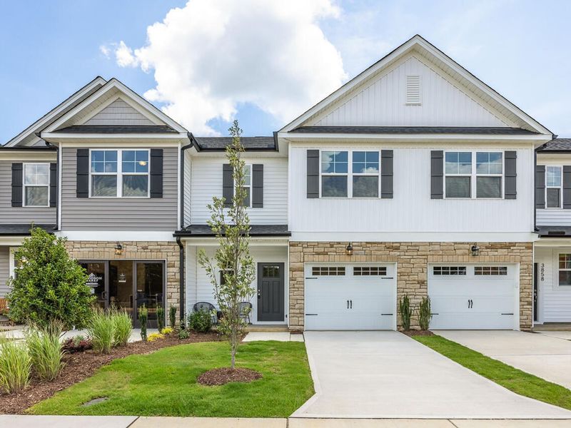 Front exterior of a new home in Springvale, Fuquay Varina, NC, highlighting curb appeal (Image 1). Front exterior of a new home in Springvale, Fuquay Varina, NC, highlighting curb appeal (Image 1).