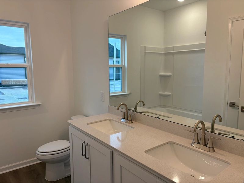 Bath 2 featuring the AW Collection® Timeless - Smooth surfaces and soft tones feel right at home.