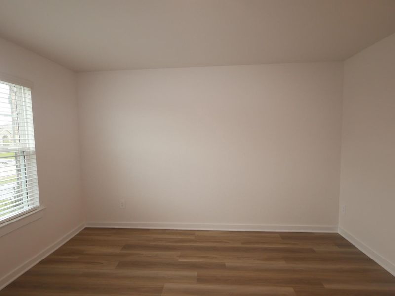 Spacious, unfurnished interior of a new home in Pinewood at Grand Texas, New Caney (Image 22).