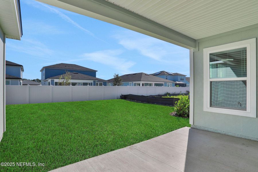 Exterior details and patio area of a home in Cordova Palms, St. Augustine (Image 3).