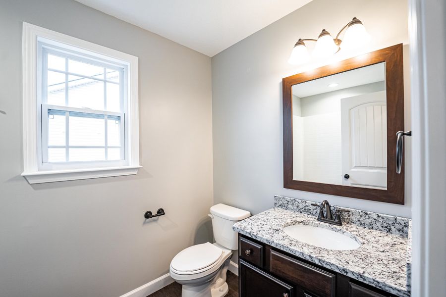 Representative furnished interior of a home built from the Saxon by Enchanted Homes in Guadalupe Heights, Seguin (Image 7).