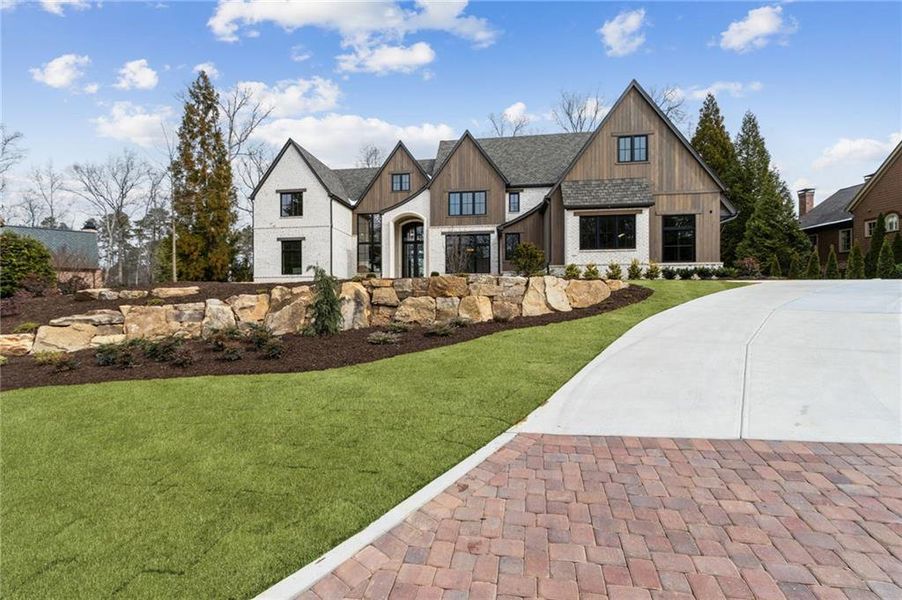 Front exterior of a new home in , Suwanee, GA, highlighting curb appeal (Image 32).